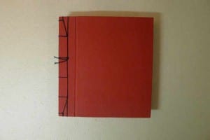 Álbum de fotos de tela lisa roja con costura japonesa
